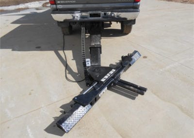 Wheel lifts for two trucks